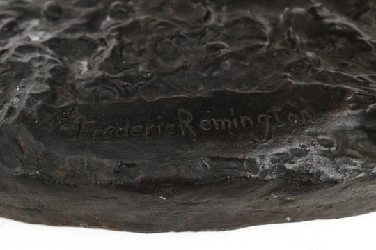 The Wounded Bunkie by Frederic Remington