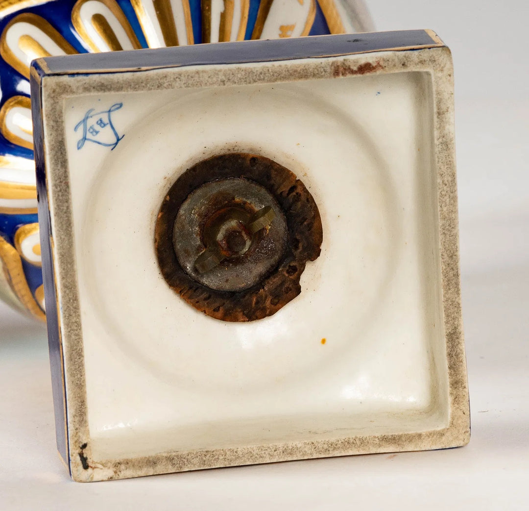 Pair of Sevres-Style Porcelain Urns