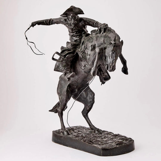 The Bronco Buster by Frederic Remington