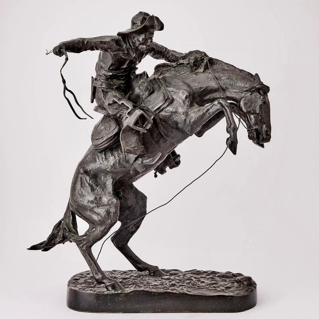 The Bronco Buster by Frederic Remington