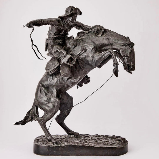 The Bronco Buster by Frederic Remington