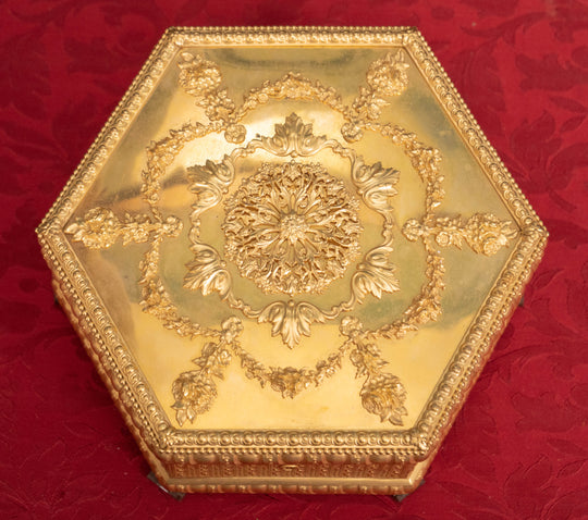 Ornate octagonal vermeil gilt bronze box with brocade lining