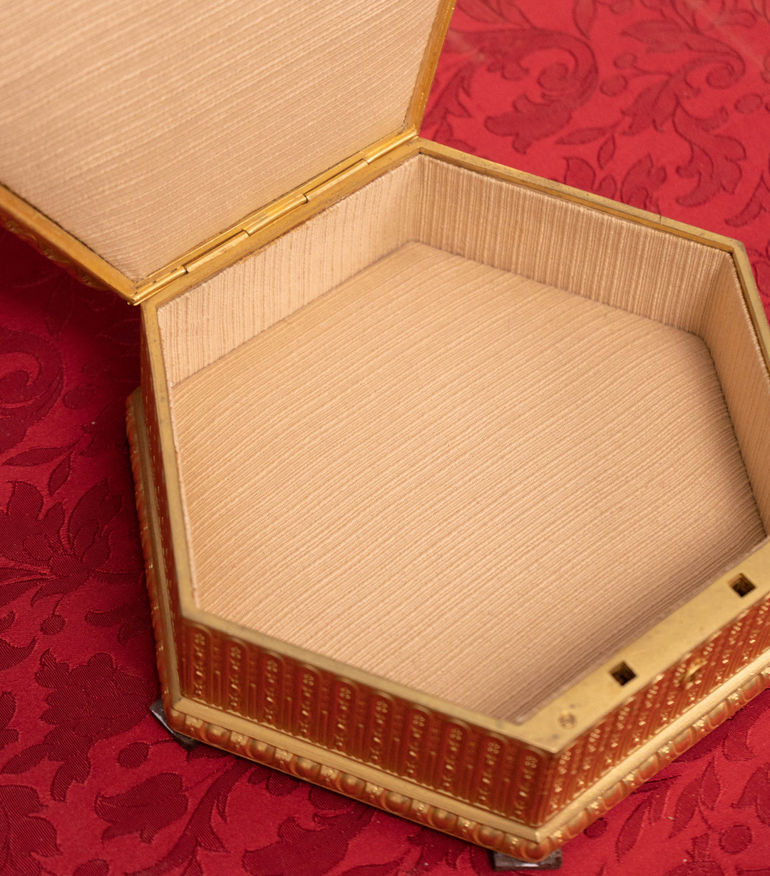 Ornate octagonal vermeil gilt bronze box with brocade lining