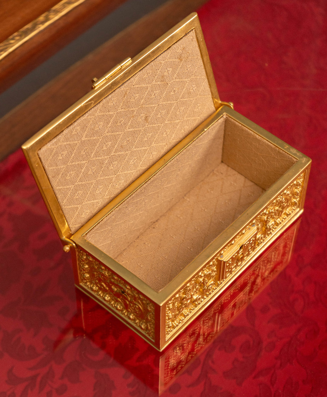 Ornate rectangle vermeil gilt bronze box with brocade lining