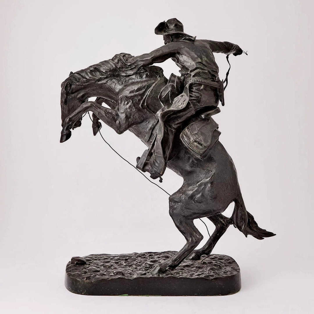 The Bronco Buster by Frederic Remington