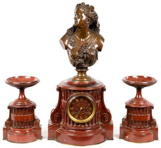 A French Rouge Griotte Mantle set by Barbedienne