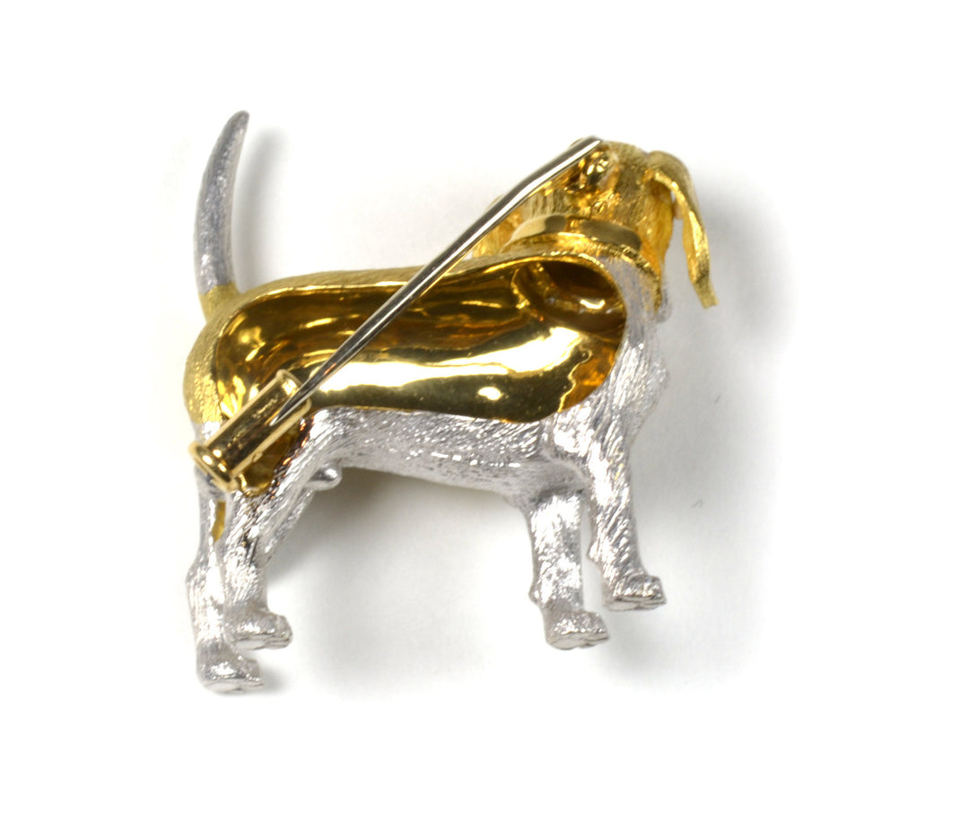 18 karat yellow and white gold, blue sapphire and diamond dog pin