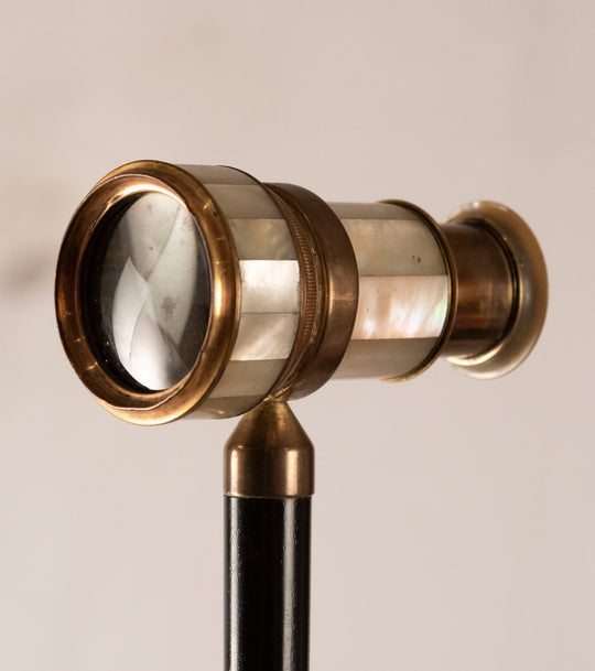 A Gilt Mother of Pearl and Ebony Walking Stick with Spy Glass (c. 1910)